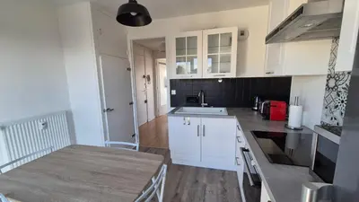 Cuisine ou kitchenette dans l'établissement Appartement Clara Parking Gratuit