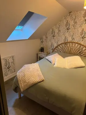 Un ou plusieurs lits dans un hébergement de l'établissement La maison de Charlotte