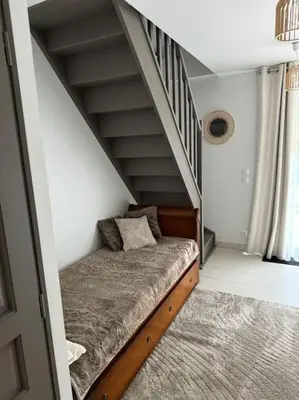 Un ou plusieurs lits dans un hébergement de l'établissement La maison de Charlotte