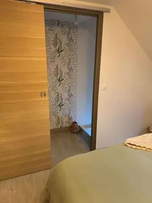 Un ou plusieurs lits dans un hébergement de l'établissement La maison de Charlotte
