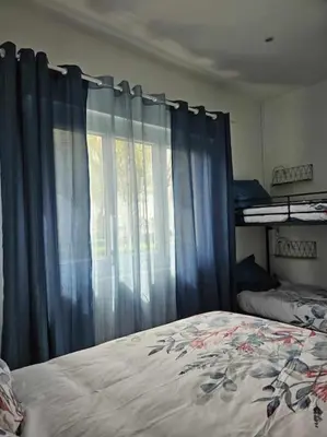 Un ou plusieurs lits dans un hébergement de l'établissement Maison Beauvais-Tillé aéroport