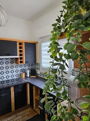 Cuisine ou kitchenette dans l'établissement Maison Beauvais-Tillé aéroport