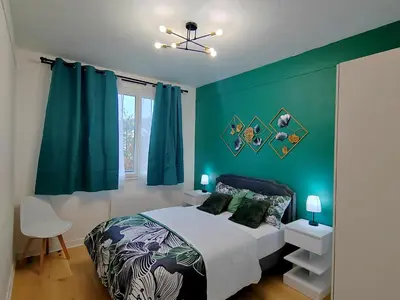 Un ou plusieurs lits dans un hébergement de l'établissement Appartement en centre ville - 5 min de la Gare - 62 m2 - 1 à 6 pers