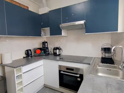 Cuisine ou kitchenette dans l'établissement Appartement en centre ville - 5 min de la Gare - 62 m2 - 1 à 6 pers