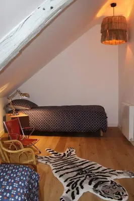 Coin salon dans l'établissement Maison l'Héritage by La Boîte en Plus