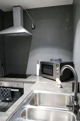 Cuisine ou kitchenette dans l'établissement Suite CinéRoom à 25 min de Paris