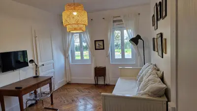 Télévision ou salle de divertissement dans l'établissement Gite dans une maison normande