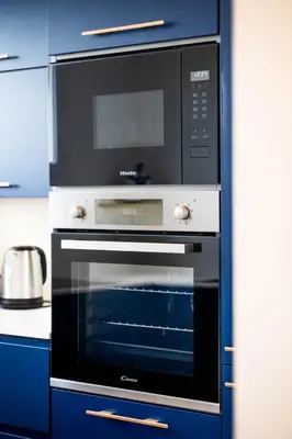 Cuisine ou kitchenette dans l'établissement Le Cocon de l'Oise - F2 Cosy au bord de l'eau