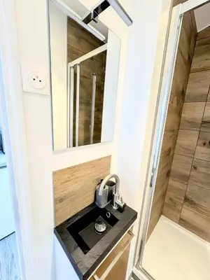 Cuisine ou kitchenette dans l'établissement Le Rêve Bleu 1er Étage