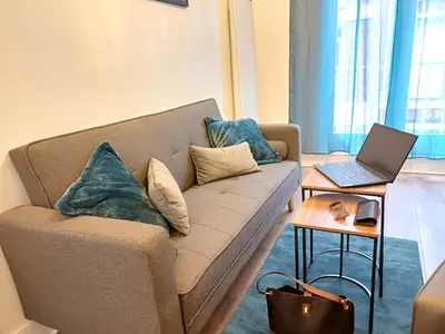 Coin salon dans l'établissement Plein centre- 90m Cathédrale - 2ch - 4 couchages - 6 personnes
