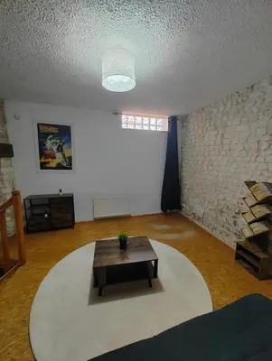 Coin salon dans l'établissement Cosy Ciné 8