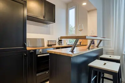 Cuisine ou kitchenette dans l'établissement Flaubert appartement avec parking idéal au cœur du centre-ville