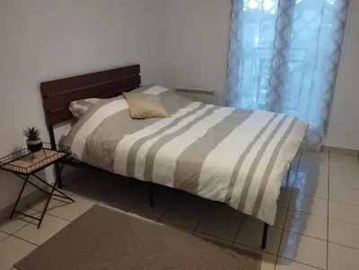 Un ou plusieurs lits dans un hébergement de l'établissement appartement entier 2 chambres