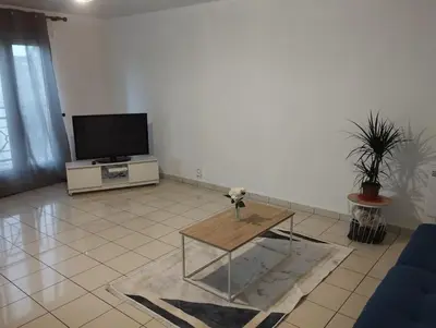 Télévision ou salle de divertissement dans l'établissement appartement entier 2 chambres