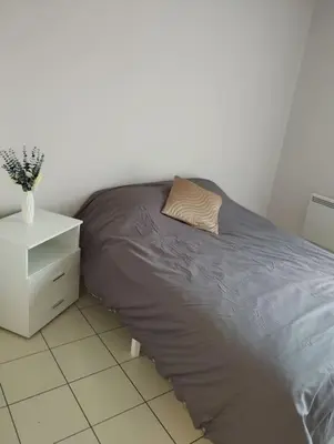 Un ou plusieurs lits dans un hébergement de l'établissement appartement entier 2 chambres