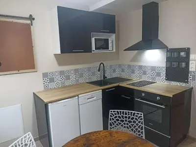 Cuisine ou kitchenette dans l'établissement Le Rêve Bulle
