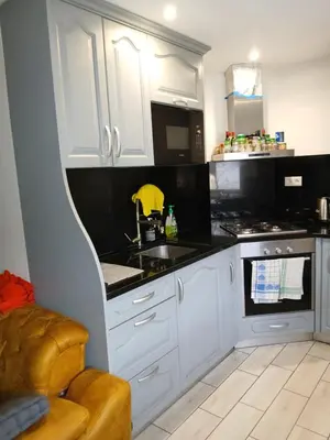 Cuisine ou kitchenette dans l'établissement Chambre ou calme