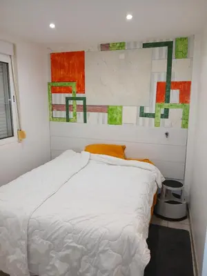 Un ou plusieurs lits dans un hébergement de l'établissement Chambre ou calme