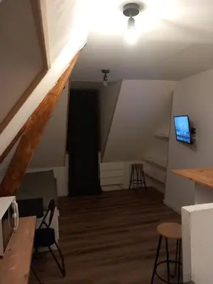 Télévision ou salle de divertissement dans l'établissement Hébergement Cozy à Deville-lès-Rouen - 13 min Rouen