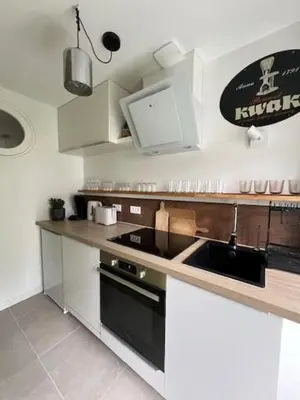 Cuisine ou kitchenette dans l'établissement Le 18 Pontcel