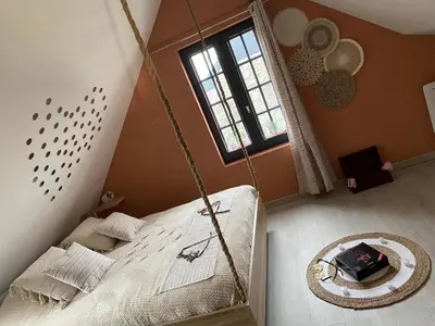 Un ou plusieurs lits dans un hébergement de l'établissement Loveroom himeros, gîte de charme avec spa