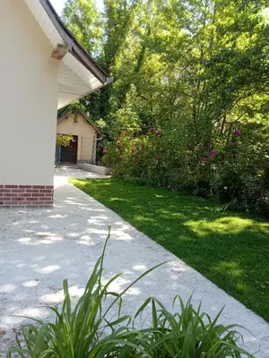 Jardin de l'établissement Le Murmure de la petite Oasis
