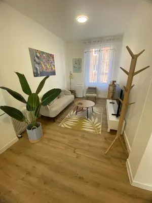Coin salon dans l'établissement Coeur de ville - Appartement 2 chambres