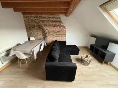 Coin salon dans l'établissement Amiens, sous les toits 4-6 pers