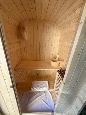 Un ou plusieurs lits dans un hébergement de l'établissement Cosy Room & SAUNA Hypercentre Dieppe