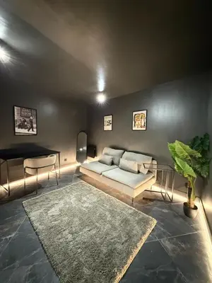 Coin salon dans l'établissement Cosy Room & SAUNA Hypercentre Dieppe
