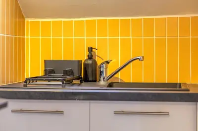 Cuisine ou kitchenette dans l'établissement Esmée votre appartement rénové en hyper-centre