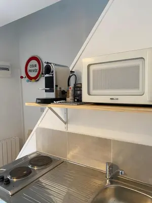 Cuisine ou kitchenette dans l'établissement Duplex quartier calme et parking gratuit