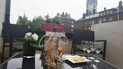 Boissons dans l'établissement Terrasse vue cathédrale et beffroi hyper centre
