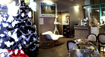 Coin salon dans l'établissement Hôtel L'Esturgeon