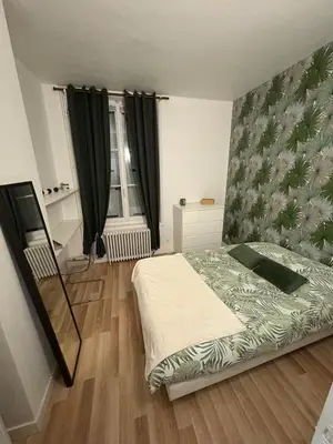 Un ou plusieurs lits dans un hébergement de l'établissement Maison de ville