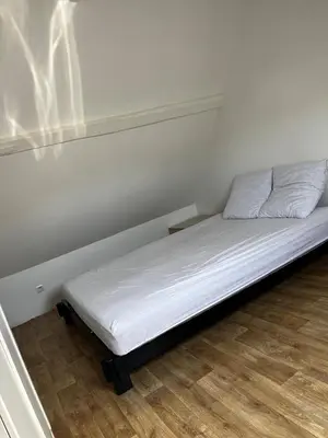 Un ou plusieurs lits dans un hébergement de l'établissement Maison de ville