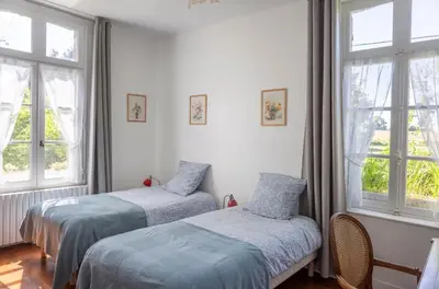Un ou plusieurs lits dans un hébergement de l'établissement Villa des glycines et Spa nordique à 1h30 de Paris