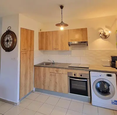 Cuisine ou kitchenette dans l'établissement Bel appartement à seulement 30 minutes de Paris-la défense