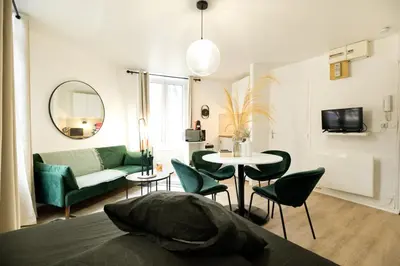 Télévision ou salle de divertissement dans l'établissement Le Lounge - studio en Hypercentre