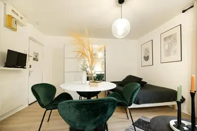 Télévision ou salle de divertissement dans l'établissement Le Lounge - studio en Hypercentre