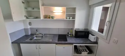 Cuisine ou kitchenette dans l'établissement Le Végétal - 5 min à pied du centre avec jardin