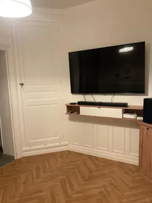 Télévision ou salle de divertissement dans l'établissement Appartement agréable et fonctionnel