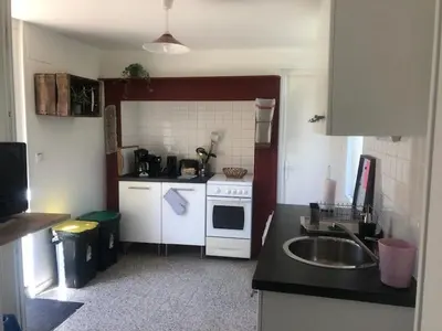 Cuisine ou kitchenette dans l'établissement Demeure paisible