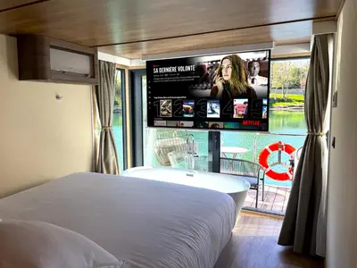 Un ou plusieurs lits dans un hébergement de l'établissement L'Escale Royale Poissy Île de Migneaux - Seine