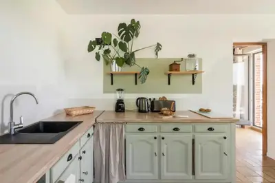 Cuisine ou kitchenette dans l'établissement Le gîte du Papillon - Normandy Holiday Cottage