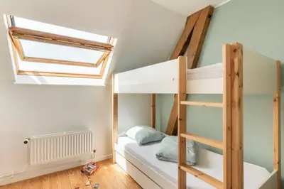 Un ou plusieurs lits dans un hébergement de l'établissement Le gîte du Papillon - Normandy Holiday Cottage