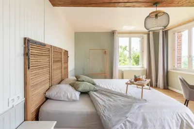 Un ou plusieurs lits dans un hébergement de l'établissement Le gîte du Papillon - Normandy Holiday Cottage