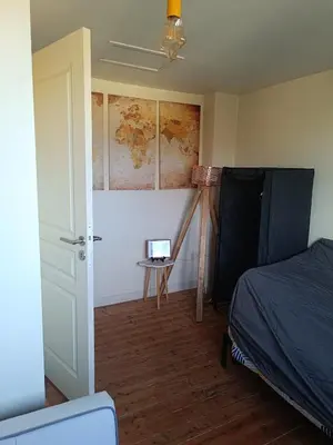 Un ou plusieurs lits dans un hébergement de l'établissement Cozy house