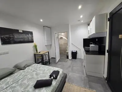 Cuisine ou kitchenette dans l'établissement STUDIO COSY Meulan En Yveline