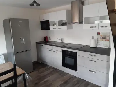 Cuisine ou kitchenette dans l'établissement Maison neuve 2 chambres